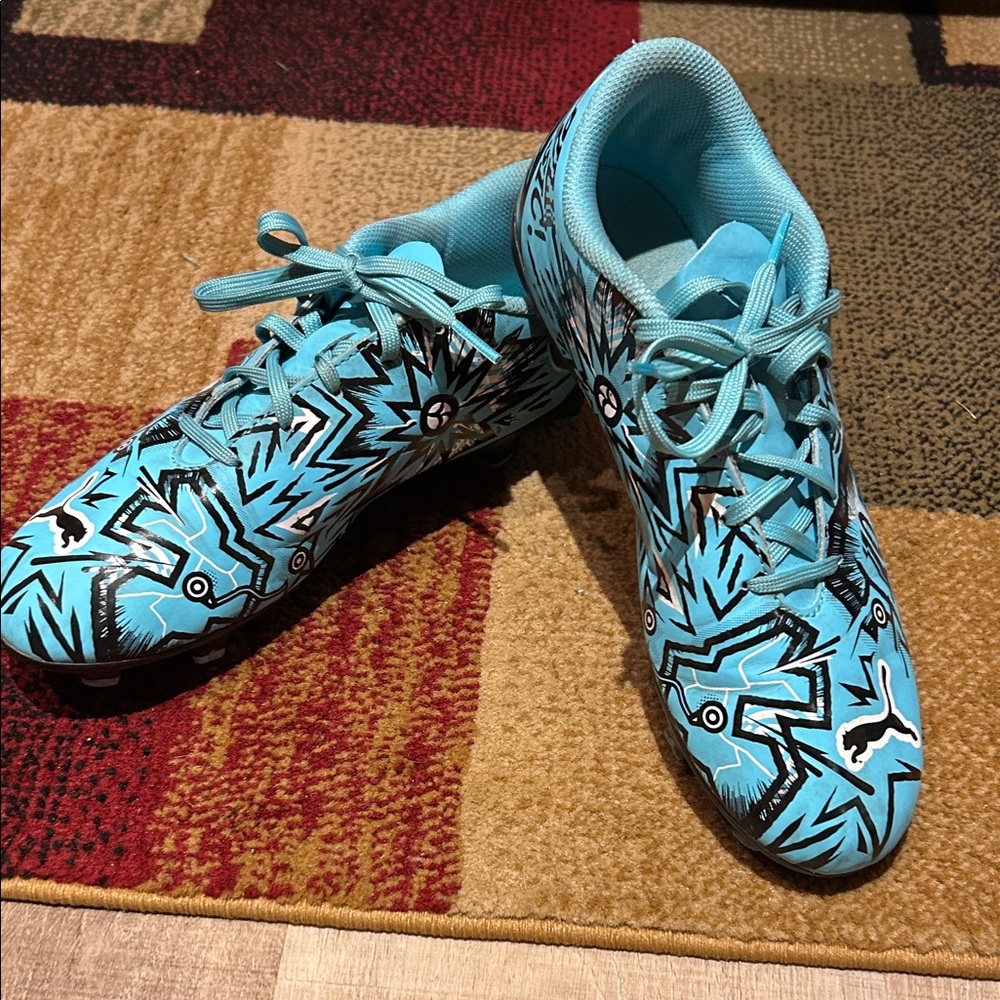 Puma Kids soccer shoes with Blue and Black Pattern